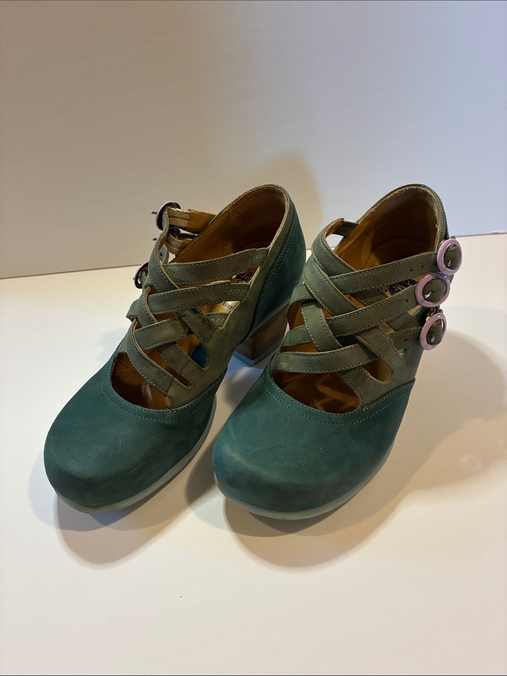 John Fluevog Teal Crisscross Strap Heels with Pink Buckles